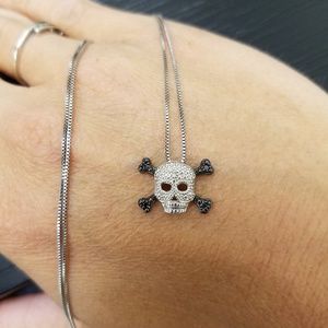 Black and White Diamond Skull Crossbones Necklace